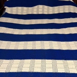 Just like Grammys Handmade crochet blanket very warm. Great for sports.55”x80”